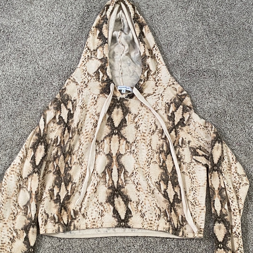 Snakeskin long sleeve shirt with hood.